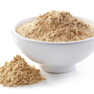 Bowl of maca powder isolated on white